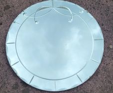 Art deco round bevelled mirror with scalloped edges