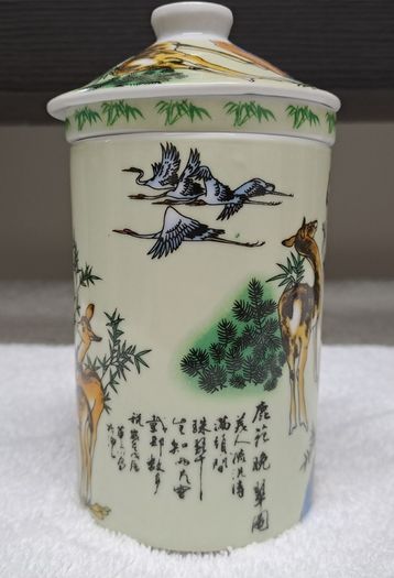 Porcelain Chinese tea mug with infuser and lid