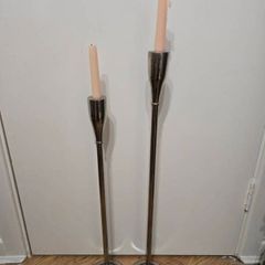 Pair of Meadows and Byrne tall silver floor candle holders