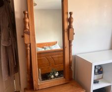 Wooden mirror with built-in drawer