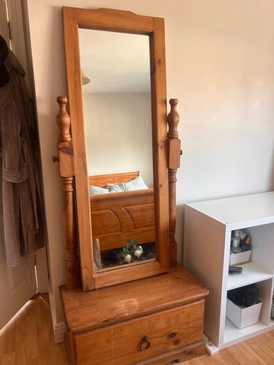 Wooden mirror with built-in drawer