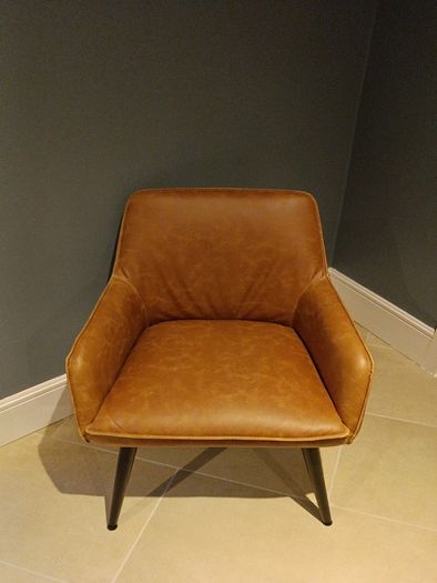 Faux leather armchair
