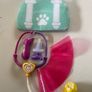 This is a VTech Hope the Rainbow Husky interactive plush toy. Image 4