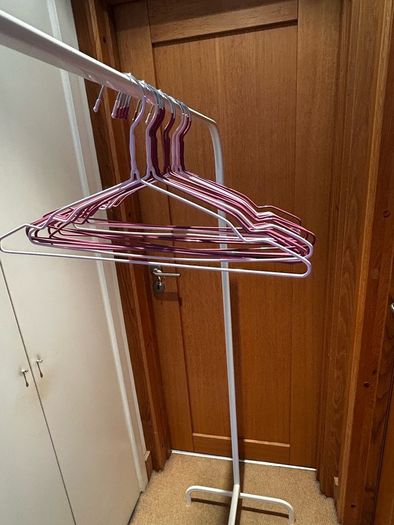 Clothing rail, hangers and storage boxes