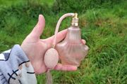 Pink perfume spray bottle postage possible