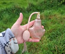 Pink perfume spray bottle postage possible