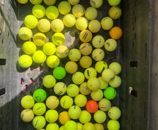 50 used mixed brand coloured practice grade golf balls