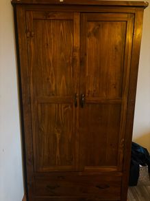 Wardrobe with single deep drawer