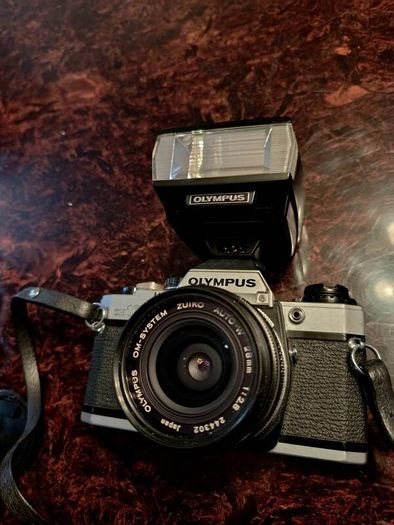 Olympus OM 10 camera with flash