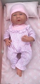 Baby doll with pink onesie EUC