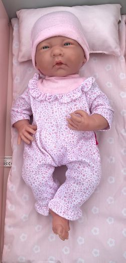 Baby doll with pink onesie EUC