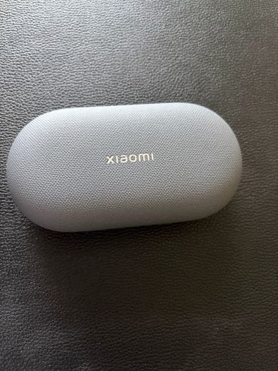 Xiaomi 14T phone with earbuds