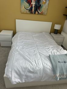 bed with 2 matching bedside lockers