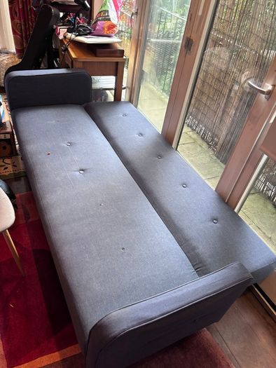 Grey fabric sofa bed