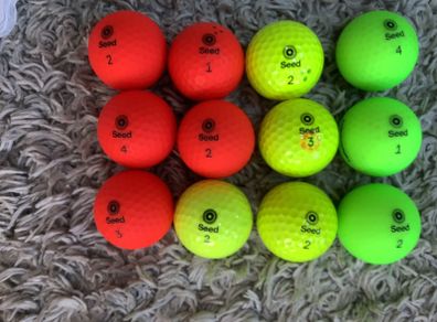 Seed golf balls per dozen  (4 dozen available)