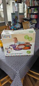 Lamaze Spin and Explore Garden Gym baby activity mat