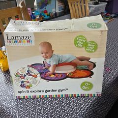 Lamaze Spin and Explore Garden Gym baby activity mat