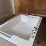 Brand new two person bath with fittings Image 4