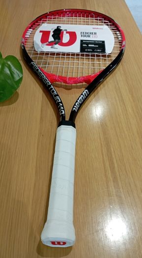 Two Wilson Federer 110 rackets (new 25, used 15)