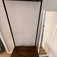 Hallway coat rack with shoe storage