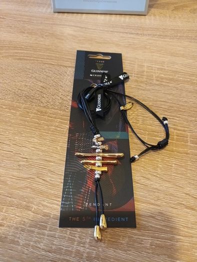 newbridge silverware Guinness pendant