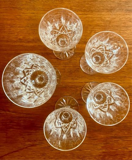 Four Waterford Crystal Lismore Sherry Glasses, One Lismore Small Wine Glass, 1970s.