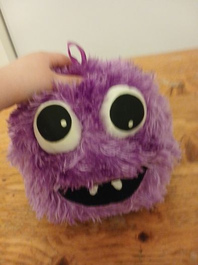 purple hairy ball