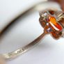 Vintage 925 Sterling Silver Ring with Central Orange Stone and Accent Stones Image 8