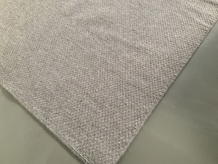 Woollen dark beige rug
