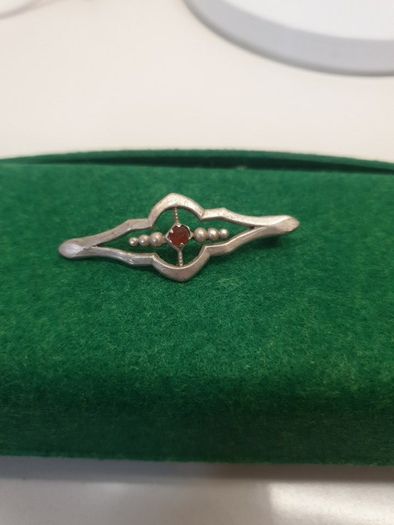 small silver brooch