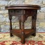 Early 20th Century solid oak gate leg drop leaf table. Image 3