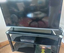 Black glass TV stand