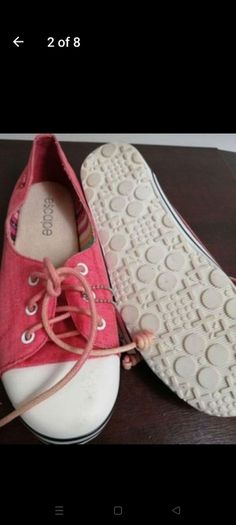 Escape. Orange canvas shoes, new with tags.