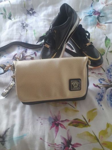 Selling  both together bag new with tags amd black and gold ladies trainers