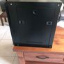 Cams wall mounted 9U cabinet with a variety of cables and connections Image 2