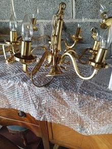Vintage brass and crystal chandelier with matching wall lights