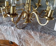 Vintage brass and crystal chandelier with matching wall lights