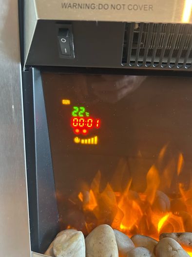 Electric fireplace with remote control