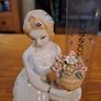 Vintage porcelain woman figurine detailed flowers Image 2