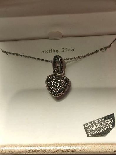 New and boxed Sterling Silver Swarovski Marcasite pendant set
