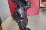 Genesis Sculpture Of A Small Girl Dressing Up With Her Moms Clothes