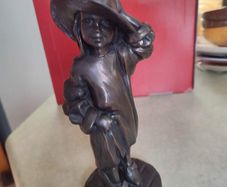 Genesis Sculpture Of A Small Girl Dressing Up With Her Moms Clothes