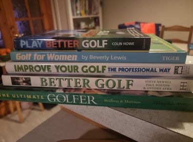 Job lot of Golf books.