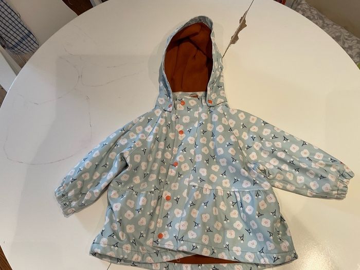 Goose and Gander green flower rain coat