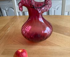 Stunning Oversized Cranberry Glass Vase . Hand blown glass with ruffle edge
