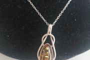 Amber and sterling silver pendant
