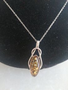 Amber and sterling silver pendant