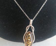 Amber and sterling silver pendant