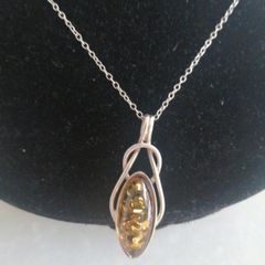 Amber and sterling silver pendant
