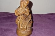 Carved praying lady statue